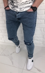 Niebieskie jeansy slim fit z dziurami 578