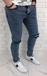 Niebieskie jeansy slim fit z dziurami 578